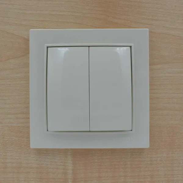 Вимикач Nilson Thor кремовий 2кл ( 27121003 ) - фото №3