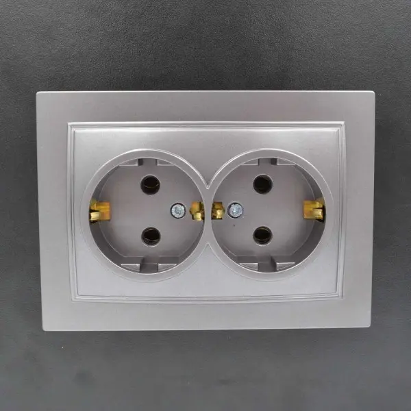 Розетка Nilson Thor серебро 2-я с заземлением ( 27131025 ) - фото №1