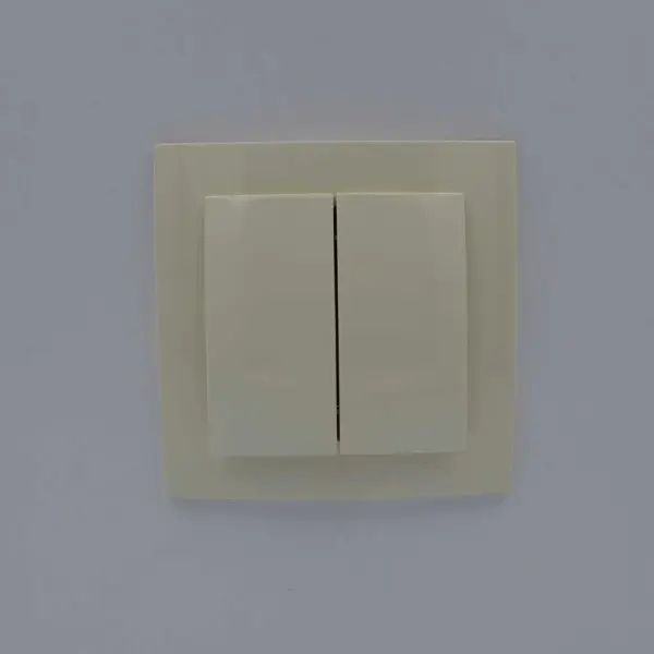 Вимикач Nilson Touran кремовий 2кл ( 24121003 ) - фото №1