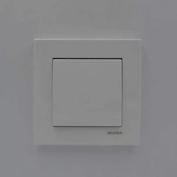 Вимикач Nilson Moda білий 1кл з підсвіткою ( 21112002 ) - фото №1