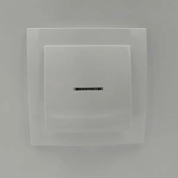 Вимикач Nilson Touran білий 1кл з підсвіткою ( 24111002 ) - фото №1