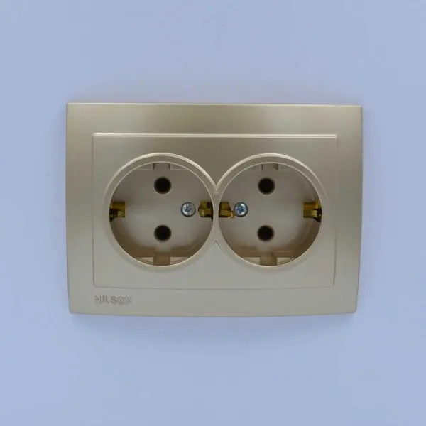 Розетка Nilson Touran золото 2-на з заземленням ( 24151025 ) - фото №1