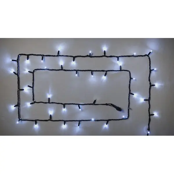 Уличная LED гирлянда Delux EN STRING 100LED (90012966) 10м (2х5м) 20 мигающих диодов IP44 (белый свет) черный шнур - фото №1 Уличная LED гирлянда Delux EN STRING 100LED (90012966) 10м (2х5м) 20 мигающих диодов IP44 (белый свет) черный шнур - фото №1
