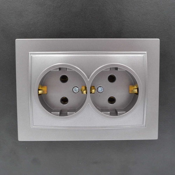 Розетка Nilson Thor срібло 2-на з заземленням ( 27131025 ) - фото №1