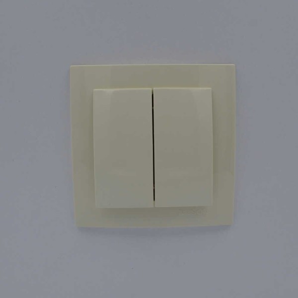 Вимикач Nilson Touran кремовий 2кл ( 24121003 ) - фото №1