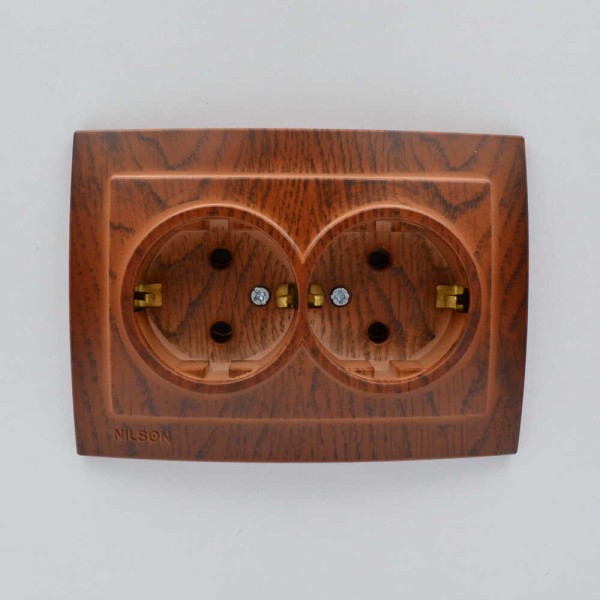 Розетка Nilson Touran орех 2-я с заземлением ( 24271025 ) - фото №1
