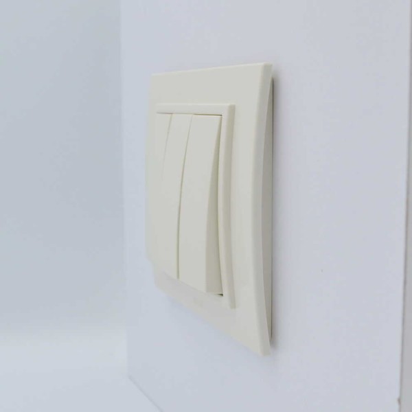 Выключатель ELBI ZENA кремовый 3кл с рамкой ( 500-010300-254 ) - фото №1